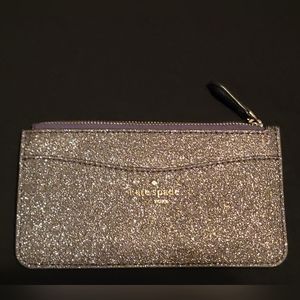 Kate Spade large slim card holder. Dusk navy (870) lola glitter.